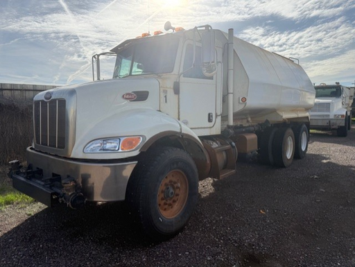 Used 2013 5000 gallon water truck on Peterbilt 348 chassis with Allison 3500-RDS automatic transmission, 15,665 miles, and 5,488 hours.